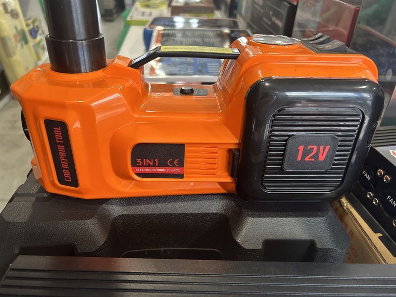 Електрогідравлічний домкрат із компресором на 12V навантаженням до 5 тонн і ліхтариком E-heelp у кейсі 2547357970 фото